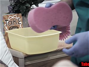 doc gives patient a sponge bath and vaginal study