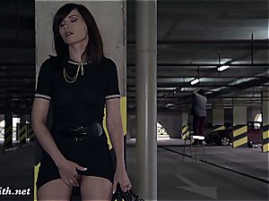 Jeny Smith unveiling her ideal figure in a parking garage